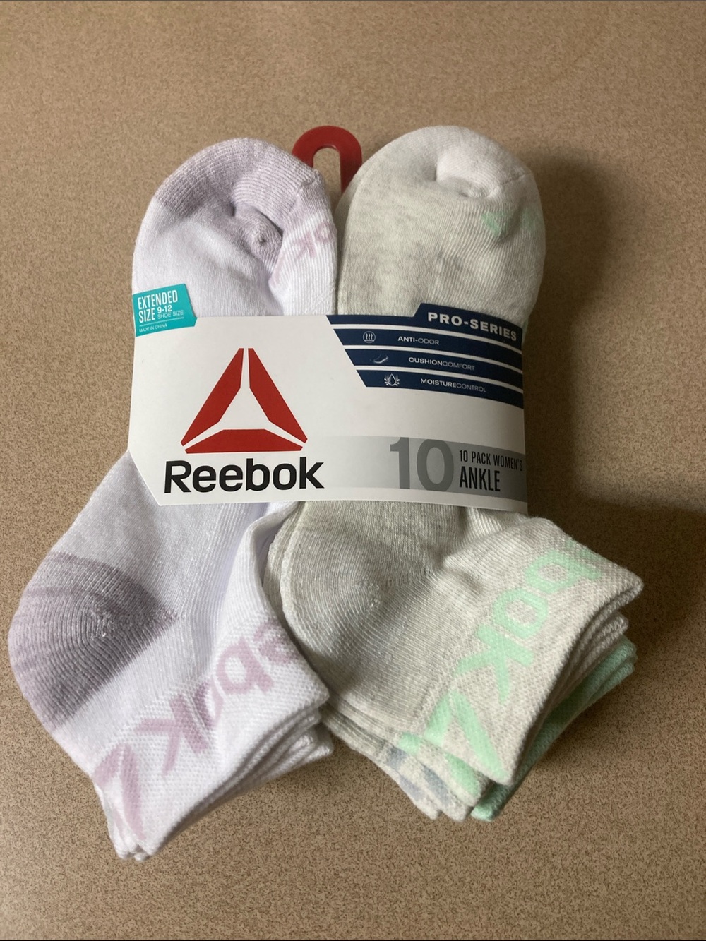 Reebok Women’s Ankle Socks in White with Gray and Mint Accents. Extended size